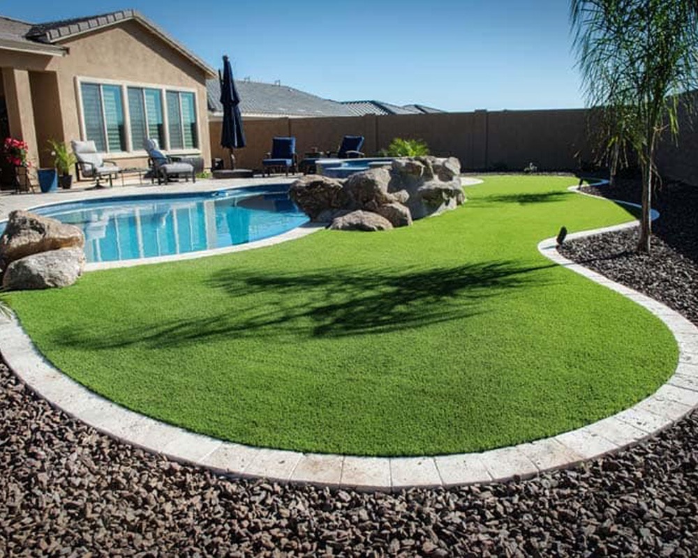 turf by swimming pool